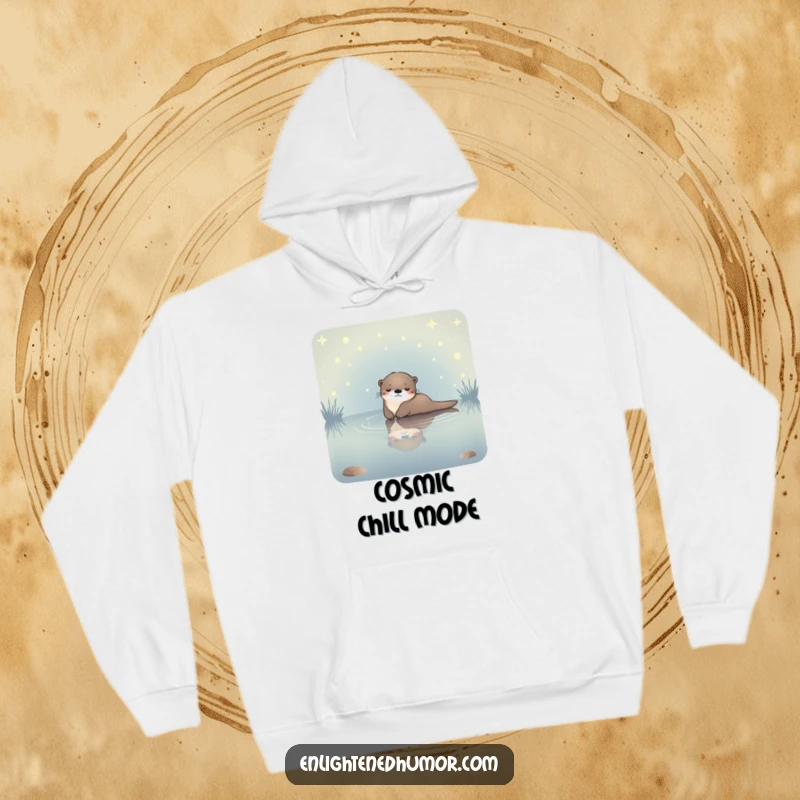 Funny celestial otter hoodie showing a serene otter floating in a starlit pond, offering warmth and a sense of cosmic peace.