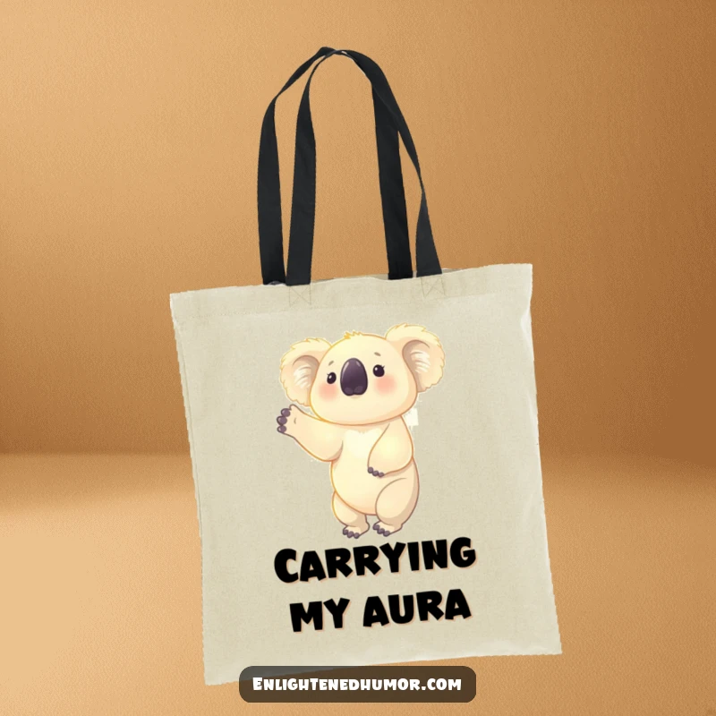 Funny tote bag showcasing a glowing koala reaching upwards, surrounded by a faint aura, ideal for carrying daily necessities with style.