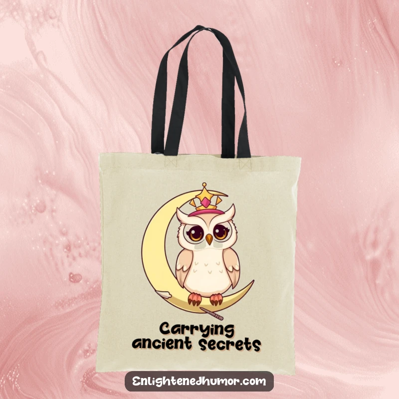 Funny celestial owl tote bag, showing a wise owl on a crescent moon with twinkling eyes.